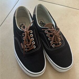 Vans black canvas sneakers with brown laces
